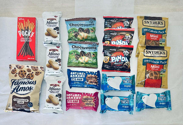 Assorted snack packages including Pocky, Milano, Chocaroons, and more on a white background