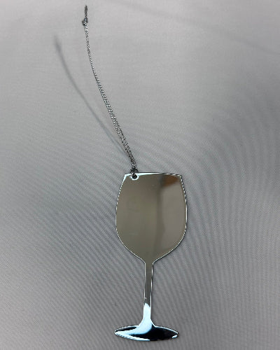 Metallic, Silver, Wine Glass Christmas Ornament with a chain on a gray background