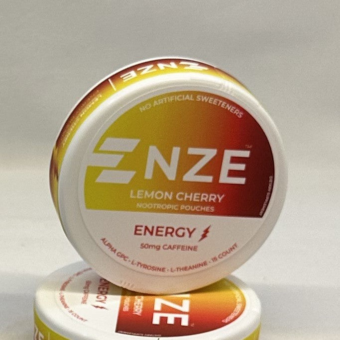 Two containers of ENZE Lemon Cherry nootropic pouches on a white background