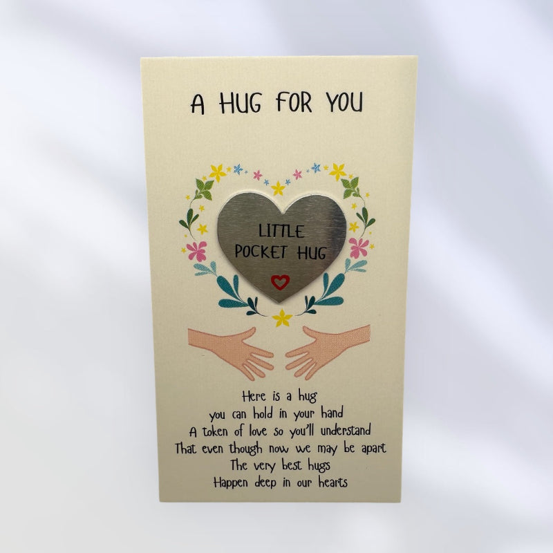 Card with a heart-shaped pocket hug and text on a beige background