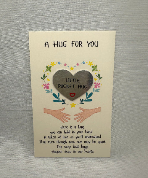 Card with 'A Hug for You' text and illustrations on a gray background