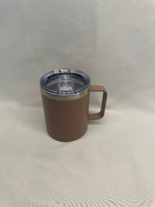 Pink tumbler with a clear lid on a light gray background