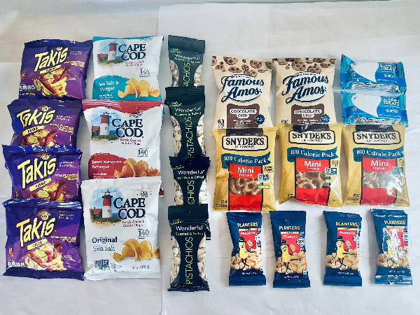 Assorted snack packs including Takis, Cape Cod, Famous Amos, Snyder's, and Planters on a white background.