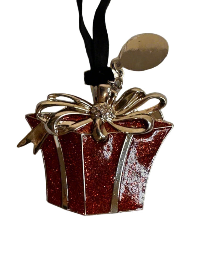Red glittery gift box Christmas Ornament bow on a gray background