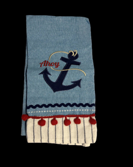 Decorative towel with anchor design and 'Ahoy' text on a blue background