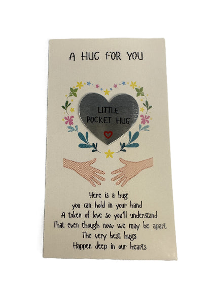 Decorative card with heart and hands design, text 'A Hug For You' and 'Little Pocket Hug'.