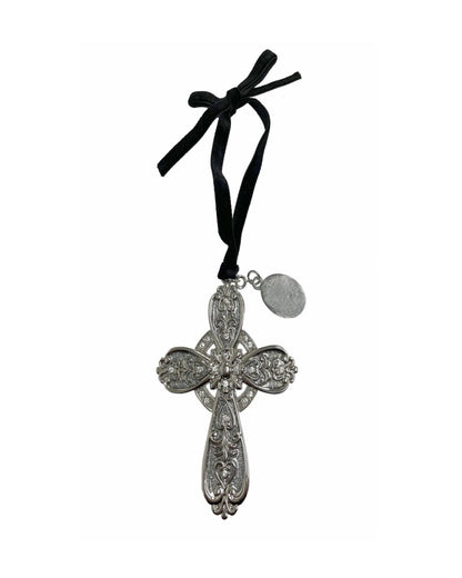 Decorative cross pendant with black ribbon on a white background