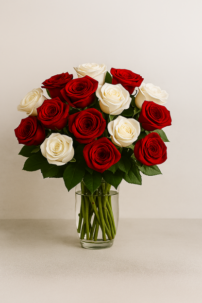 Elegant bouquet of fresh red and white roses in a clear glass vase, perfect gor anniversaries, military gift and long distance love